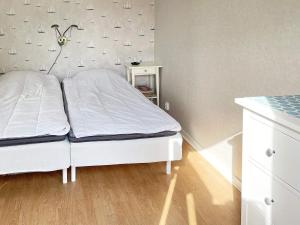 Postel nebo postele na pokoji v ubytování Holiday home SÖLVESBORG XI
