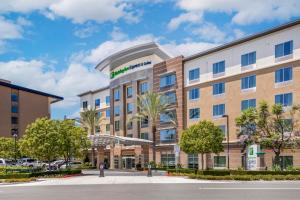 an exterior view of a hotel at Holiday Inn Express & Suites Anaheim Resort Area, an IHG Hotel in Anaheim