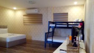 Postel nebo postele na pokoji v ubytování Mahalta Resorts and Convention Center