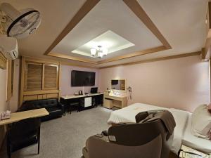 TV a/nebo společenská místnost v ubytování Hotel G7 Daejeon