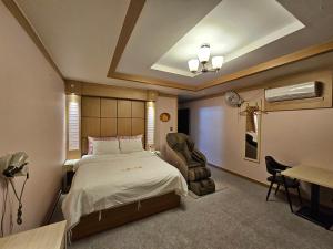 Postel nebo postele na pokoji v ubytování Hotel G7 Daejeon