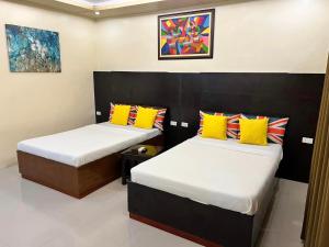 Tempat tidur dalam kamar di Hotel Casa Teofista