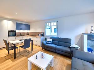 Η κουζίνα ή μικρή κουζίνα στο Villa Beatrice in Binz - WG 2 mit Terrasse strandnah +19 φωτογραφίες