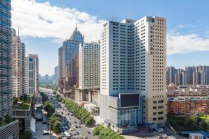 an aerial view of a city with tall buildings at The Westin Shenyang in Shenyang