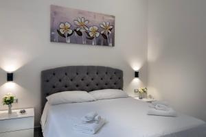 Ένα ή περισσότερα κρεβάτια σε δωμάτιο στο Irooms Foria 215