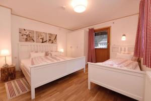 Posteľ alebo postele v izbe v ubytovaní Haus Berta, Montafon