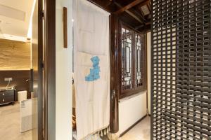 Cucina o angolo cottura di Yangzhou Aihehua Boutique Homestay