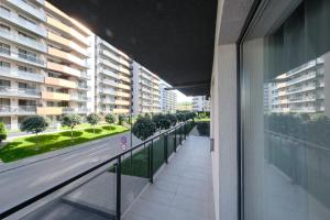 En balkon eller terrasse på Grand Park Green Iulius Mall