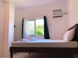 Ein Bett oder Betten in einem Zimmer der Unterkunft Chill Out Hostel