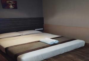 Postel nebo postele na pokoji v ubytování Hotel Austin Paradise