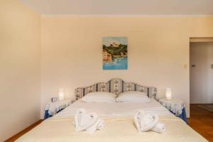 Postel nebo postele na pokoji v ubytování Holiday home in Jadranovo 33199