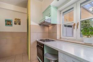 Kuchyň nebo kuchyňský kout v ubytování Holiday home in Jadranovo 33199