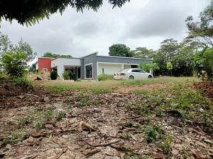 a house with a car parked in front of it at Tilvia home stay in Kitui. The holiday home in Tulia