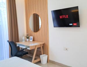TV a/nebo společenská místnost v ubytování Olivia SOHO Guest House