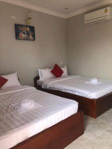 Postel nebo postele na pokoji v ubytování Kro Nhep Guesthouse