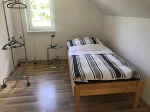 Postel nebo postele na pokoji v ubytování Lepa Dolenjska