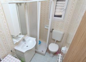 Koupelna v ubytování Apartments Milka