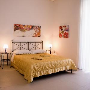 Tempat tidur dalam kamar di Alle Antiche Terme