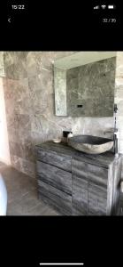 a bathroom with a sink and a mirror at Paraíso sobre el Mar Torremolinos Santa Clara in Torremolinos