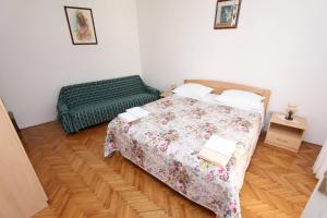 Postel nebo postele na pokoji v ubytování Apartments Milka