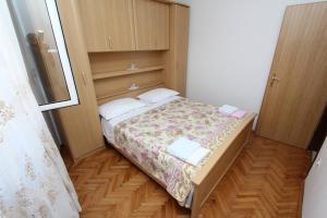 Postel nebo postele na pokoji v ubytování Apartments Milka