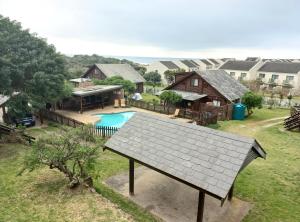 an aerial view of a house with a pool at The beach cabin with pool in Port Alfred