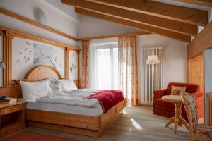 Ένα ή περισσότερα κρεβάτια σε δωμάτιο στο Hotel Gianna