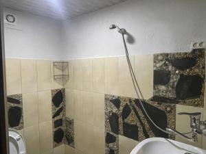 A bathroom at Qusha Guesthouse Meeting in the mountains and views