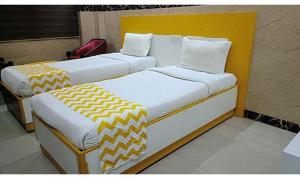 Postel nebo postele na pokoji v ubytování FabHotel Prime Stalin Pleasant Park - Triplicane