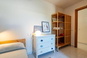Postel nebo postele na pokoji v ubytování Villa Can Pop des Trenc