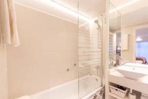 Kúpeľňa v ubytovaní Serennia Fira Gran Via Exclusive Rooms