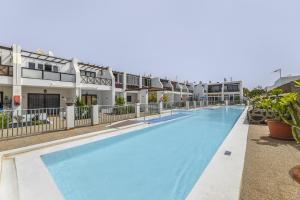 an image of a swimming pool at a resort at Casa Aldea in Puerto del Carmen