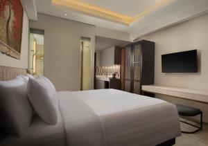 TV a/nebo společenská místnost v ubytování Trembesi Hotel