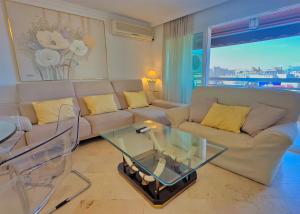 Posedenie v ubytovaní Parque Marbella Three Bedroom Apartment