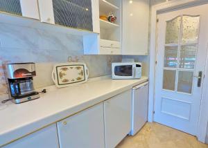 Kuchyňa alebo kuchynka v ubytovaní Parque Marbella Three Bedroom Apartment