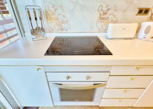 Kuchyňa alebo kuchynka v ubytovaní Parque Marbella Three Bedroom Apartment