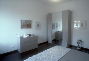 Een bed of bedden in een kamer bij Casa Vacanze Garbatella