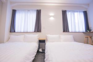 Un pat sau paturi într-o cameră la Cozy 4-Guest Stay in Heart of Asakusabashi, Tokyo DEoY