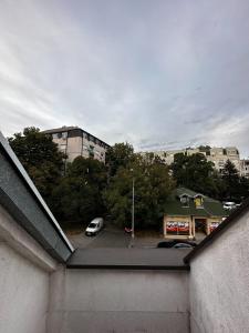 a view of a parking lot with a car parked at Cozy loft in Belgrade +2 photos