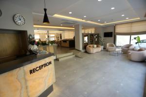 a reception area of a lobby with a reception desk at Peramis Hotel & Spa in Antalya