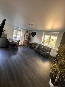 a living room with a couch and a table at Comfy apartment in the center in Chişinău