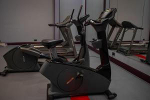 a row of exercise bikes in a gym at Peramis Hotel & Spa in Antalya