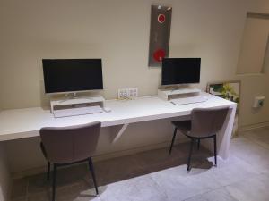 TV a/nebo společenská místnost v ubytování Hotel razaB