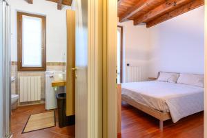 Postelja oz. postelje v sobi nastanitve Rivalta di Gazzola - appartamento con giardino