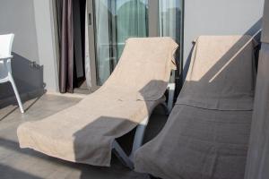 two hospital beds sitting next to a window at Peramis Hotel & Spa in Antalya