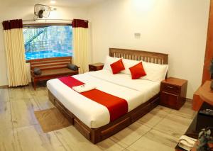 Postel nebo postele na pokoji v ubytování Agasthya Private Pool & Park villa