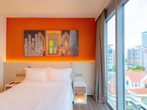 Mercure Singapore Bugis客房内的一张或多张床位