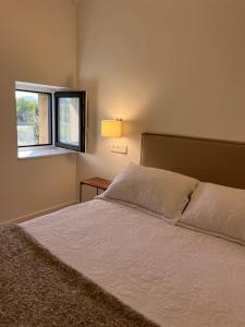 Cama o camas de una habitación en La Casona de Suesa