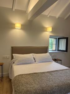 Cama o camas de una habitación en La Casona de Suesa