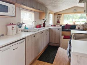 Fotografie z fotogalerie ubytování Lakeside Cotswold Holiday Home v destinaci Cirencester